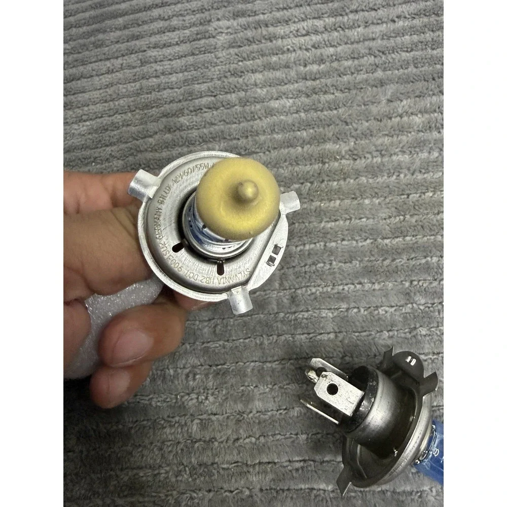 H4 12V 60/55W halogen headlight bulb.